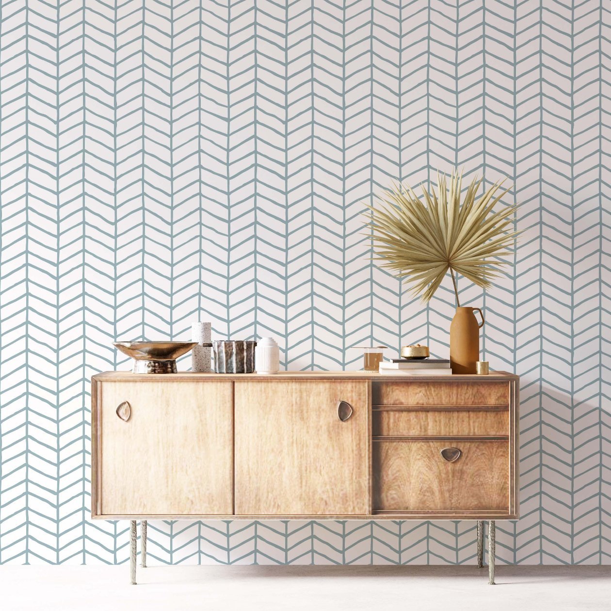 Hand-drawn herringbone wallpaper featuring painterly strokes, creating a balanced pattern with a calm and structured feel.