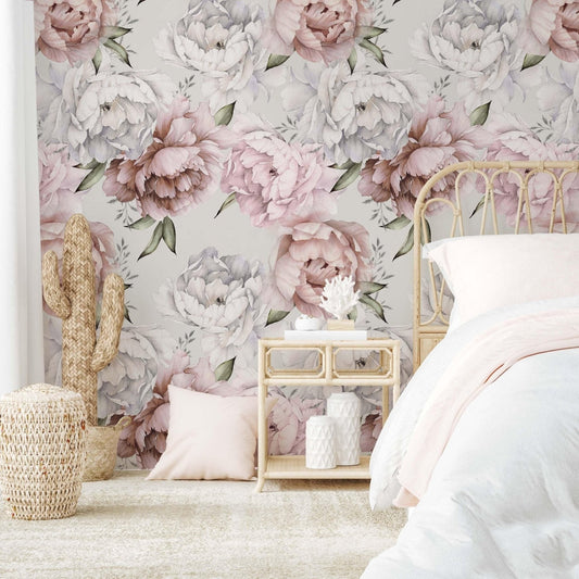 Elegant floral wallpaper with large, pastel-colored peonies in shades of blush pink, cream, and muted lavender on a light background, adding a romantic touch to a bedroom.
