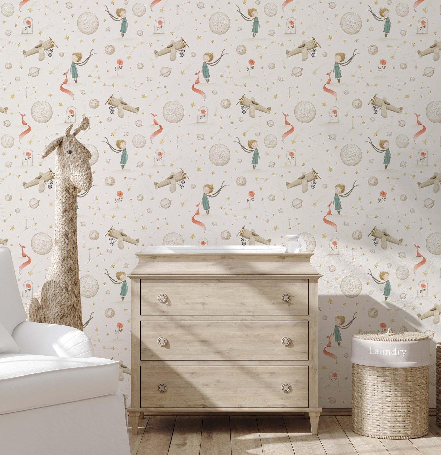 Baby bedroom with a pastel wallpaper with illustrations of airplanes, planets and little prince.