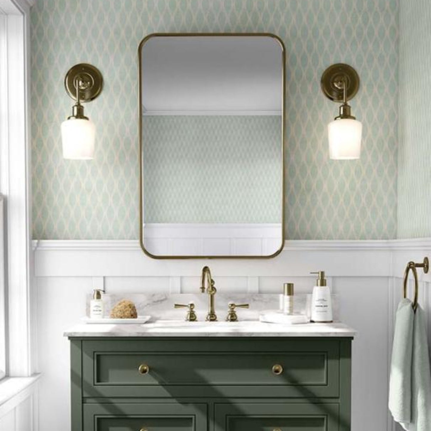 A chic bathroom with a striking classic green and white geometric wallpaper, offering a unique and eye-catching design.