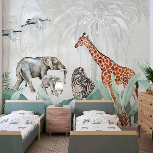 A wallpaper mural with a giraffe, zebra and elephant with its baby in the jungle.