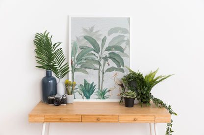 Banana trees and storks wall art on a wood desk