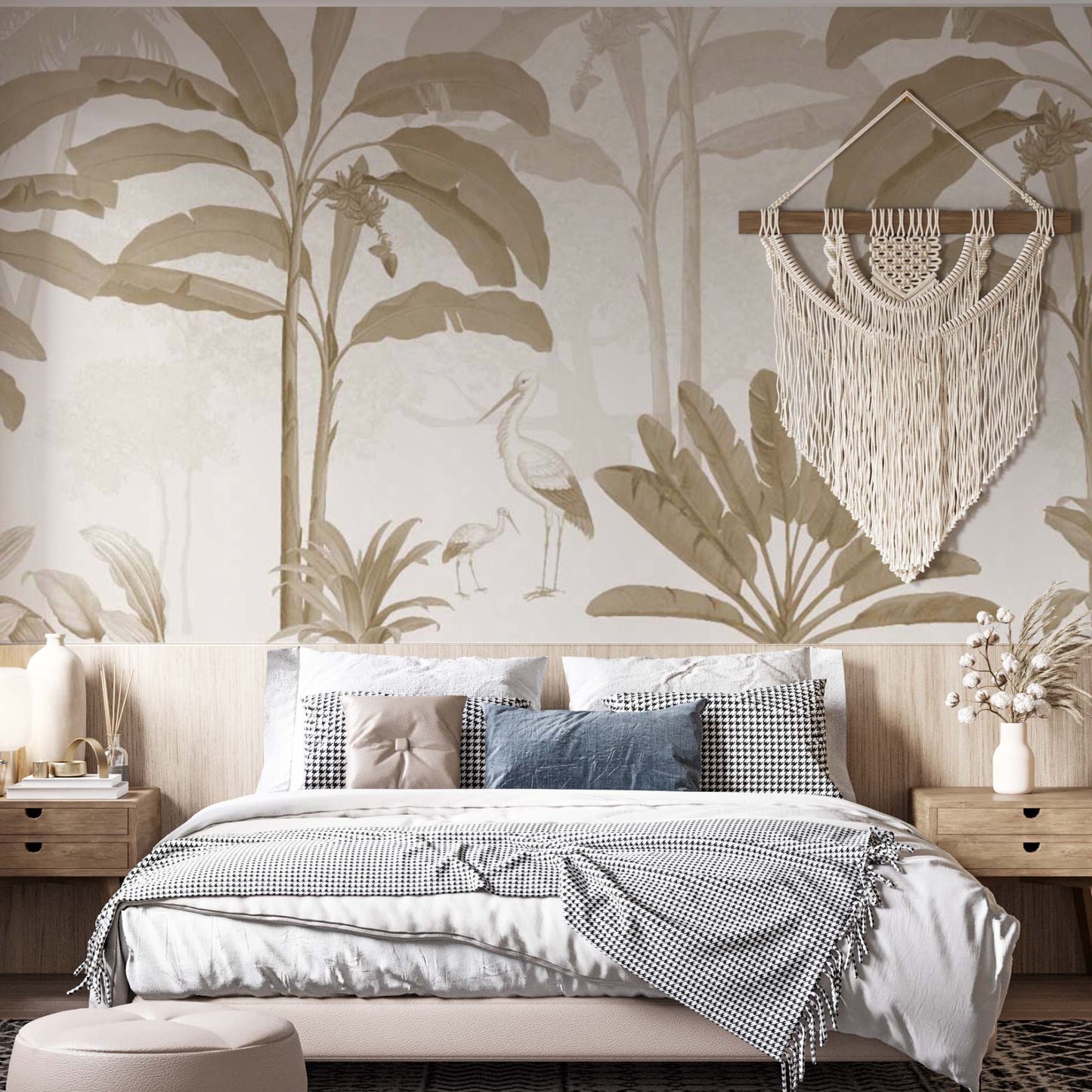 cat-610567389512 Earthy tropical bedroom wall mural with warm banana tree leaves behind a bed with macrame decor