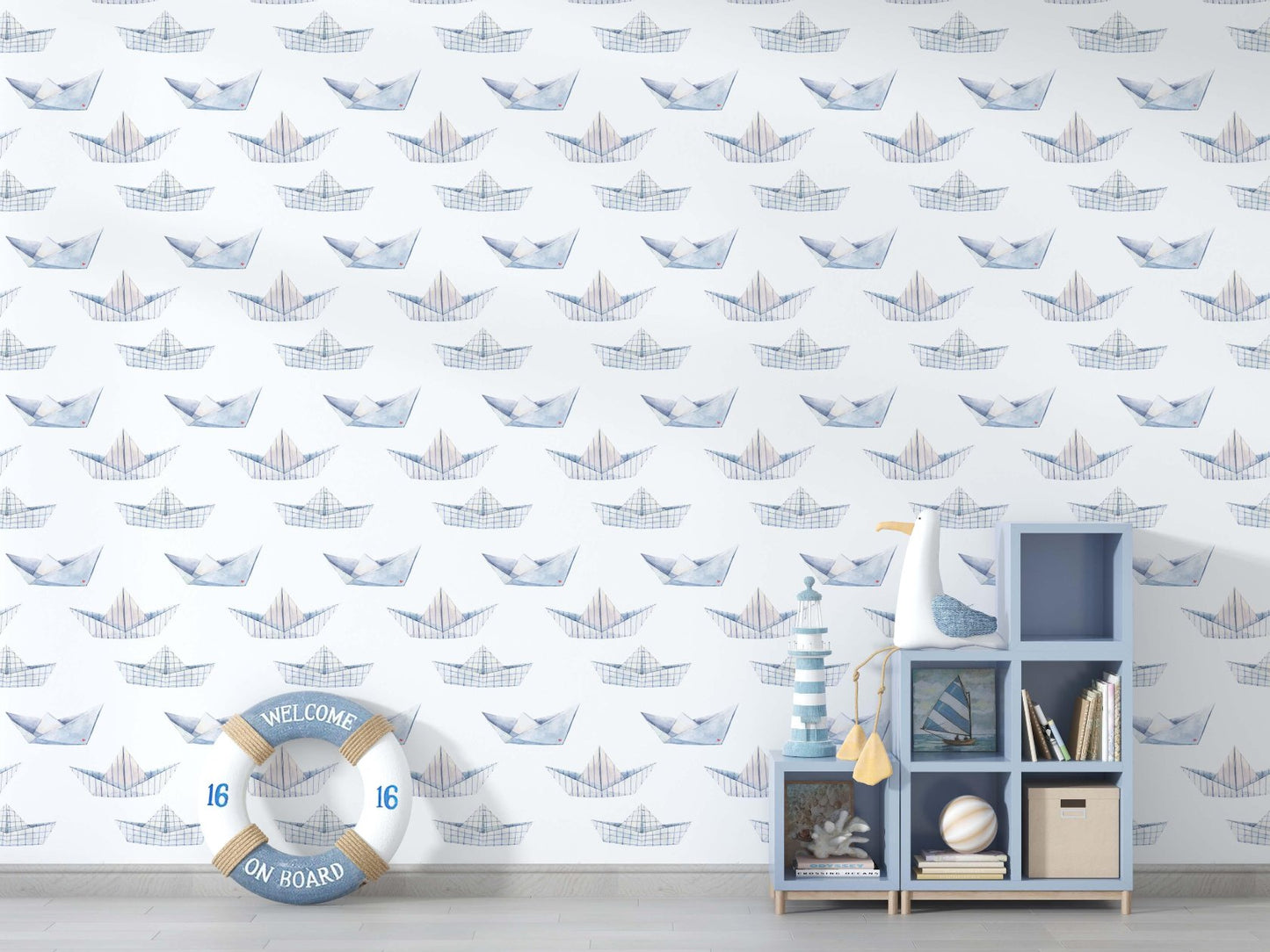 Nautical-themed wallpaper in blue and white, adorned with various boat designs for a coastal aesthetic.