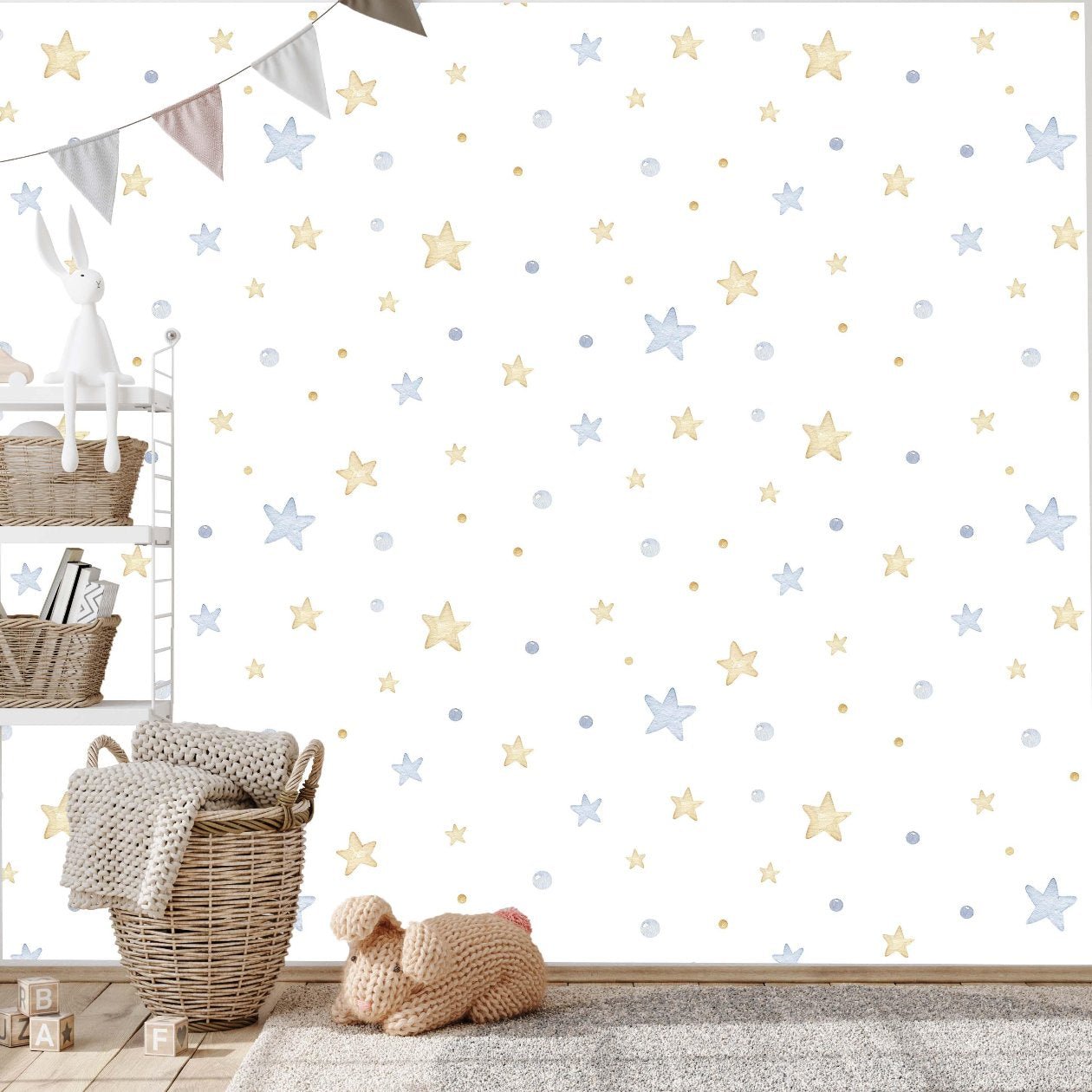 A cozy baby's room featuring a whimsical wallpaper adorned with stars and dots, creating a serene and enchanting atmosphere.