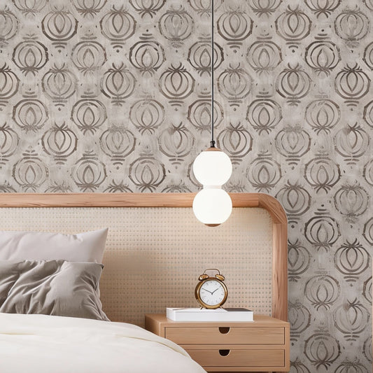 cat-616983200072 Modern boho bedroom featuring beige tribal wallpaper with a linen texture, styled with a rattan headboard, light wood nightstand, and a stylish double globe pendant light.