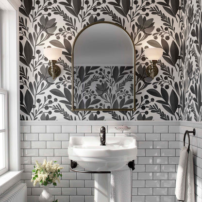 cat-610804236616 Large-scale black and white floral pattern with stylized leaves and flowers above white subway tiles in a classic bathroom setting.
