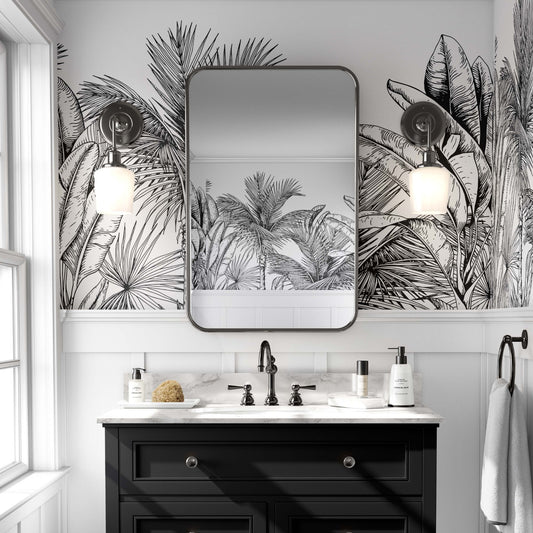 cat-610804236616 Modern bathroom with a black and white tropical leaf wallpaper mural above a black vanity and marble countertop.