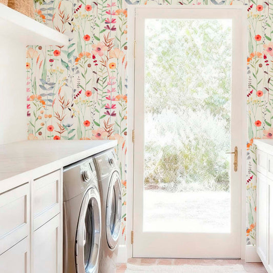 cat-615198490952 Modern laundry room with white cabinets, a glass door, and colorful floral wildflower wallpaper.
