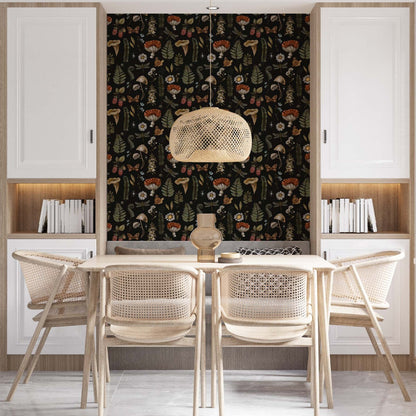 cat- 659356549448 A modern dining area featuring a cozy breakfast nook with moody botanical wallpaper as a backdrop. The dark pattern, filled with mushrooms and forest elements, is framed by custom white cabinetry. A light wood table is paired with four woven cane chairs, while a large rattan pendant light hangs above, creating a warm and inviting organic-modern aesthetic