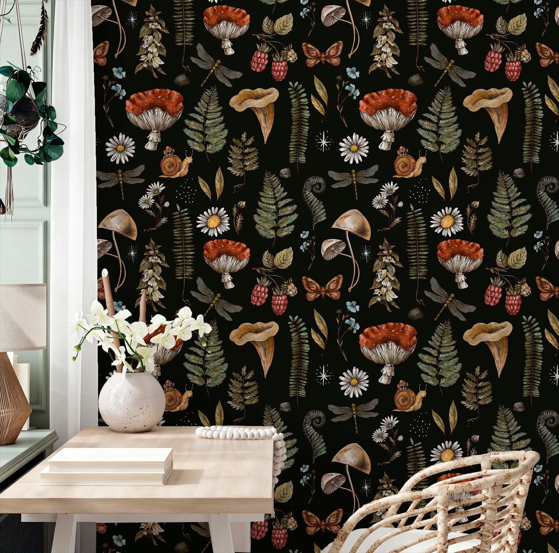 cat-610804433224 A sophisticated home office showcasing an atmospheric botanical wallpaper with vintage-style illustrations of mushrooms and forest wildlife. The dark, intricate pattern creates a striking backdrop for a minimalist wooden desk and a woven rattan chair, blending natural textures with a scholarly, antique aesthetic.