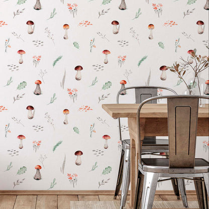 cat- 659356549448 Dining room interior featuring watercolor mushroom wallpaper on a white background, paired with a wooden table, industrial metal chairs, and a wicker basket on oak flooring.