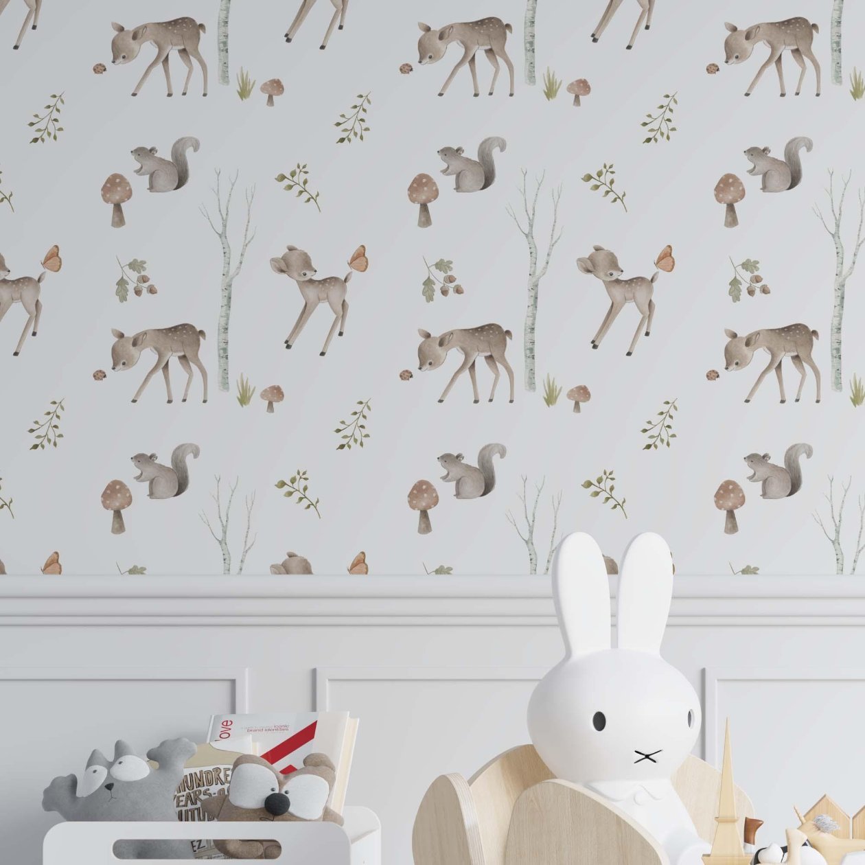 Woodland wallpaper in a nursery bedroom featuring a white wainscot.
In light tones for your baby.
