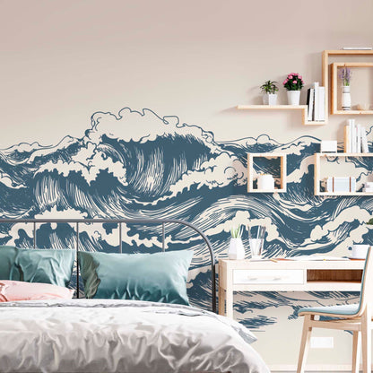 Great Wave wallpaper mural in a teen bedroom with blue graphic waves on beige background, light wood furniture and teal bedding