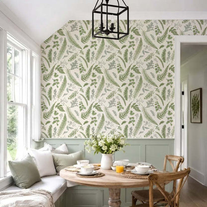 cat-659356549448  Botanical fern wallpaper in a bright breakfast nook with sage green bench seating, a round wooden table, and natural light.