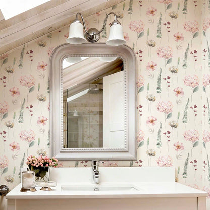 Bathroom with hydrangea watercolor wallpaper in blush pink, fresh and delicate floral style.