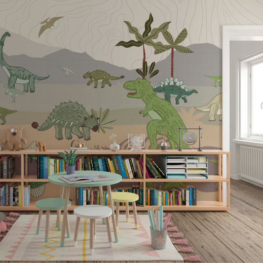 Colorful kids’ playroom with a dinosaur-themed wall mural, low bookshelf filled with books, small round table with stools, and pastel decor.