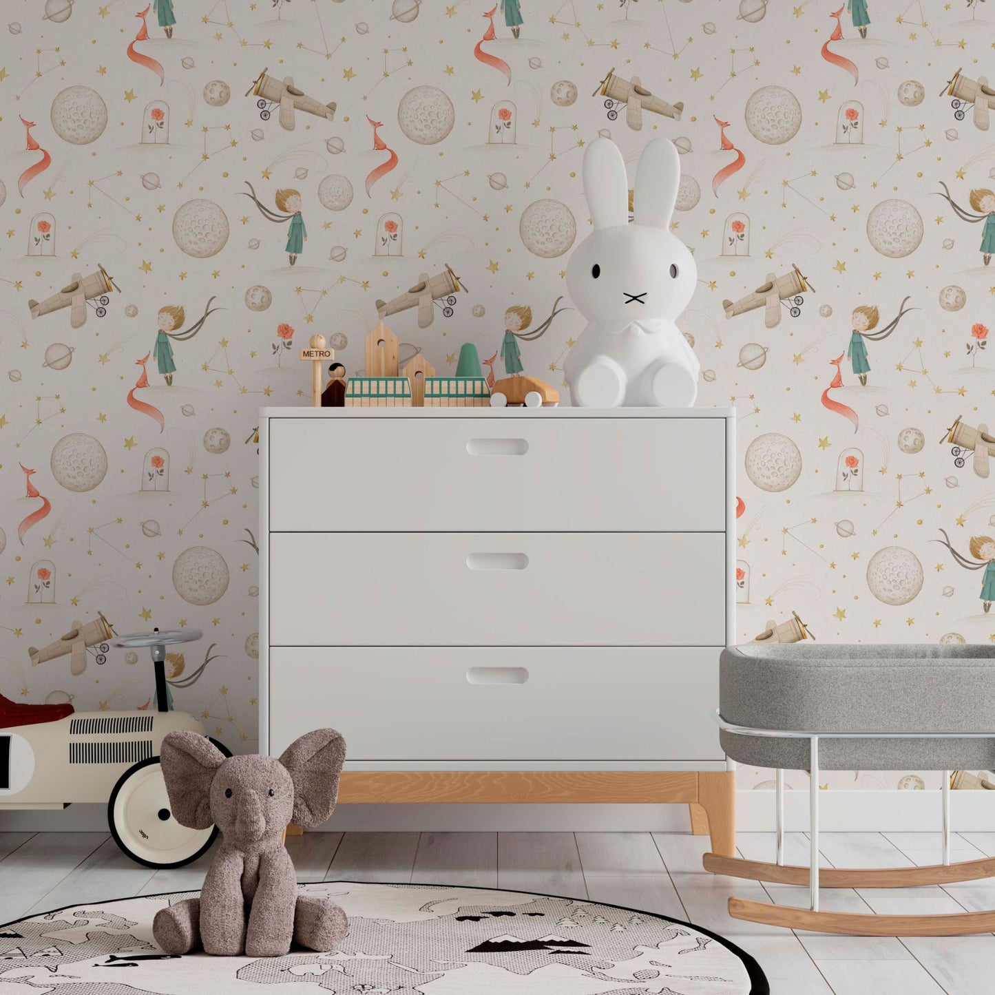 Nursery wallpaper featuring soft watercolor illustrations of the Little Prince, floating planets, stars, and vintage airplanes in a cozy children’s room