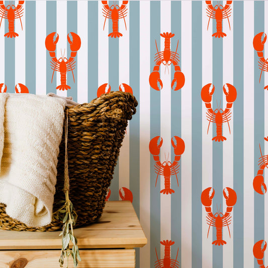 cat-615198490952 Detailed view of Lobster and Stripes wallpaper in a coastal laundry room setting with a wicker basket on a wooden bench.