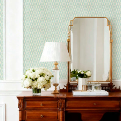 cat-610804433224 Mint green and gold geometric wallpaper installed behind a classic wooden vanity with a gold mirror.
