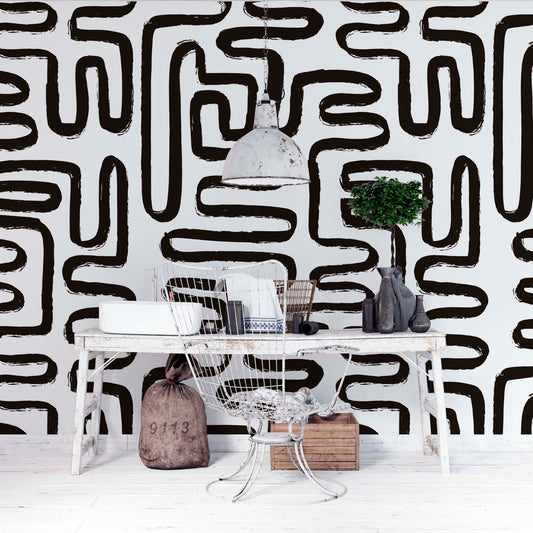 rustic office with a black and white wallpaper