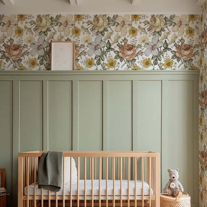cat-615198294344 Baby nursery featuring vintage floral wallpaper in ochre and dusty pink tones, sage green wainscoting, a natural wood crib, and warm rustic decor.