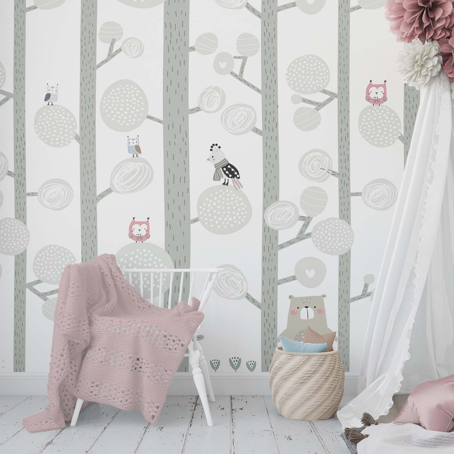 sweet nursery bedroom with a pastel color woodland wallpaper mural