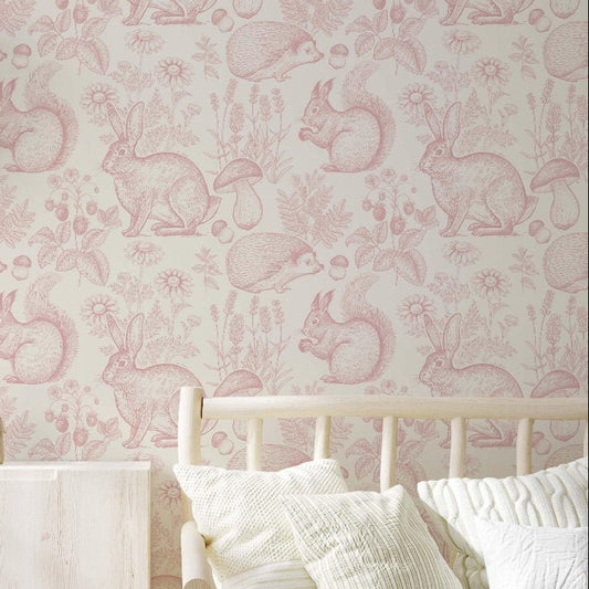 A vibrant children's room in pink and white, showcasing a bed, dresser, and an engaging wallpaper with forest animalsl for a playful environment.