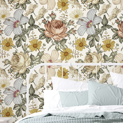 Rose and daisy floral wallpaper installed as accent wall in a bedroom