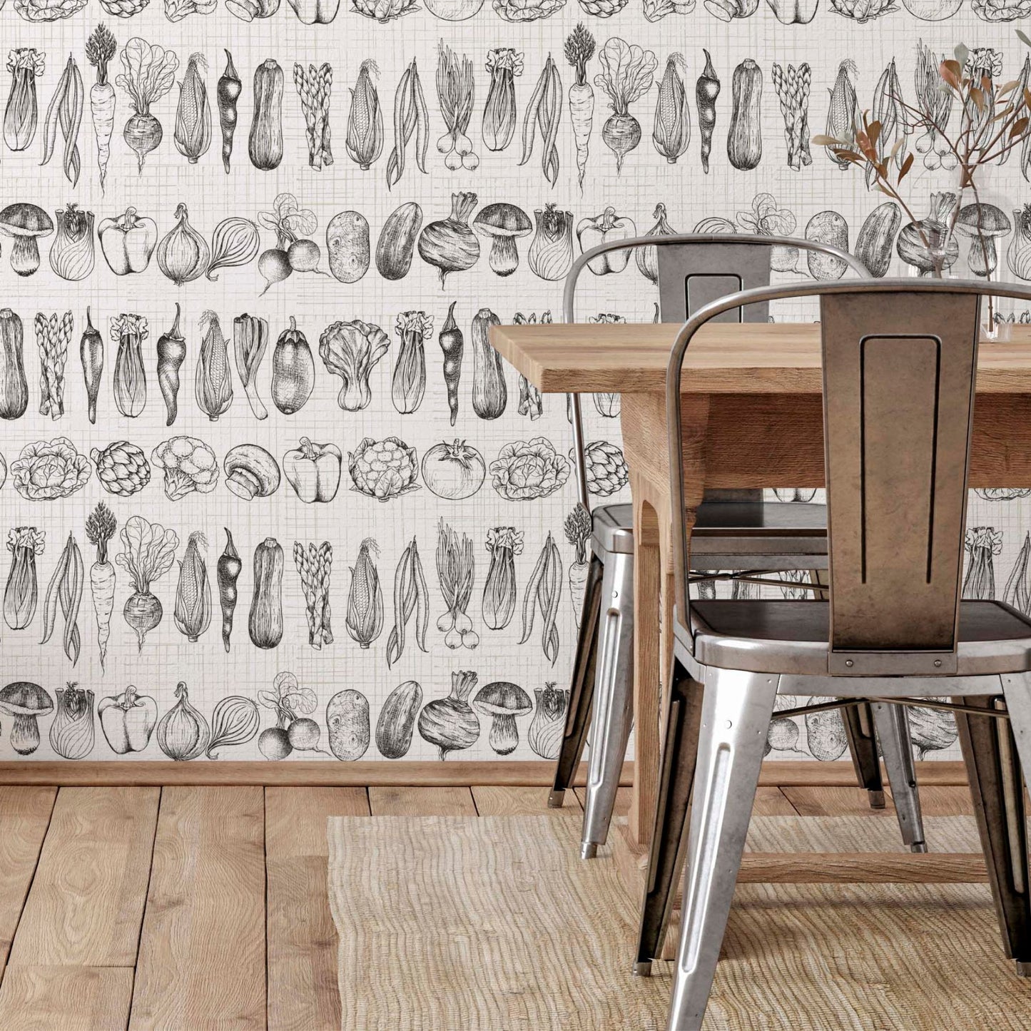 cat-659356549448  Rustic dining room featuring a wooden table and galvanized metal chairs against a wall with black and white vegetable sketch wallpaper. The floor is light wood with a jute rug.