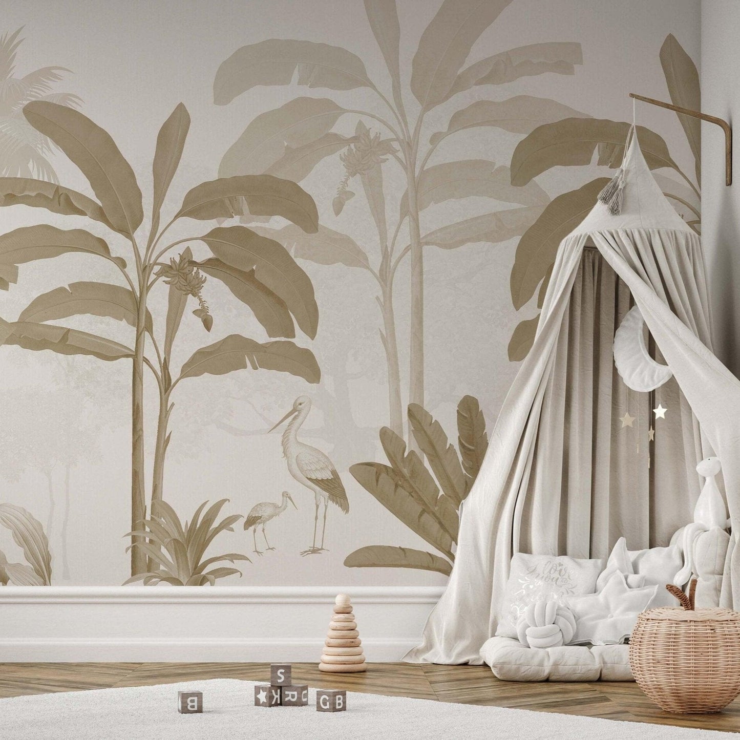 sweet nursery with an earth tone tropical mural