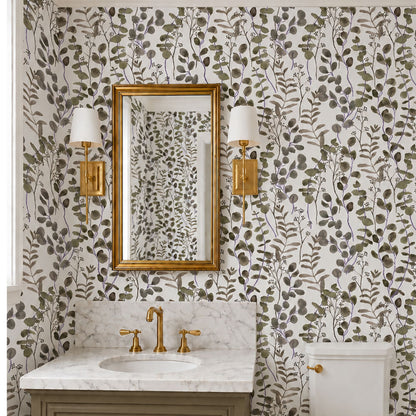 Modern bathroom featuring Taupe Eucalyptus Wallpaper with hand-painted watercolor eucalyptus branches, marble vanity and brass fixtures.