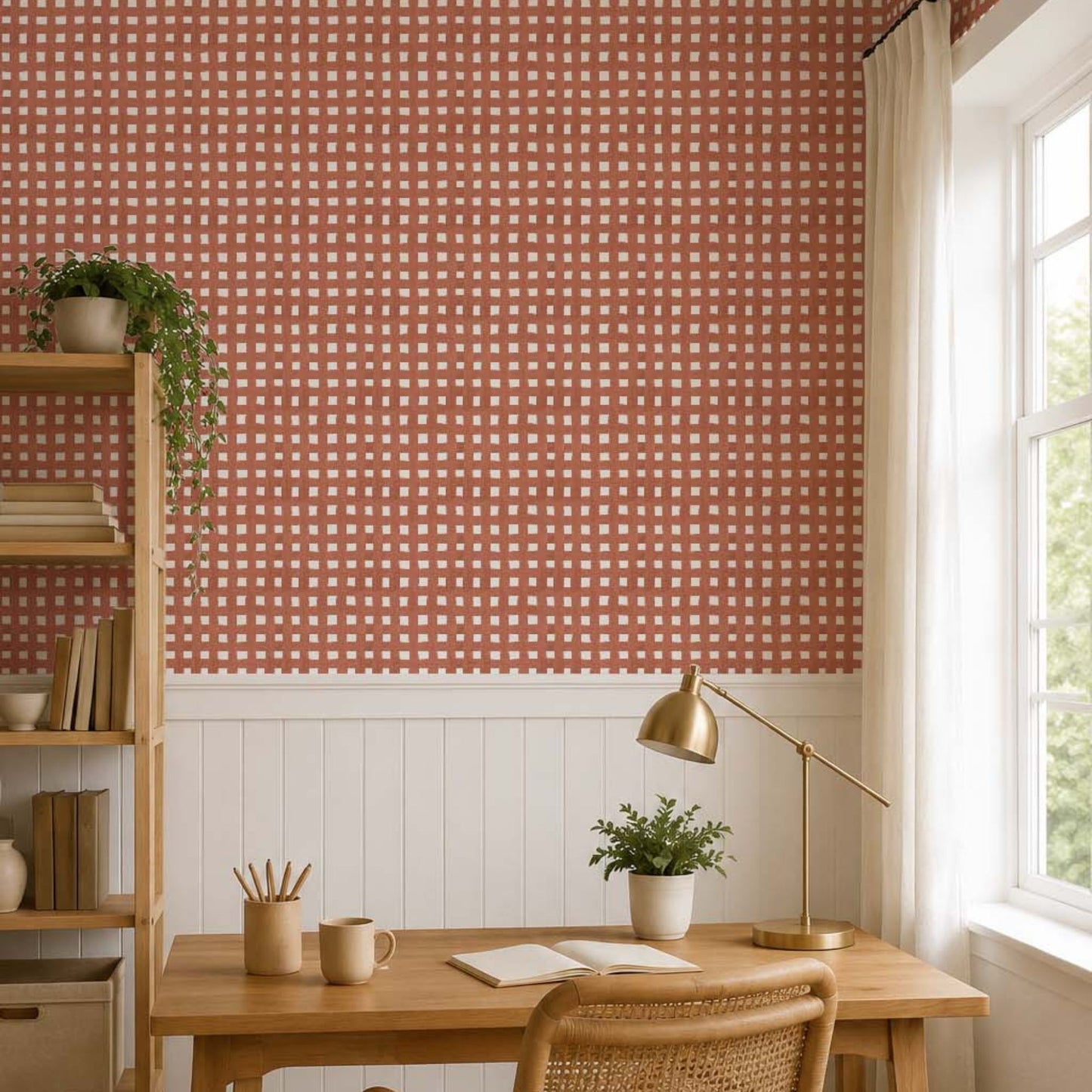cat-610804433224 Minimal Scandinavian home office with terracotta gingham wallpaper, wooden desk, woven chair, and white wainscoting.