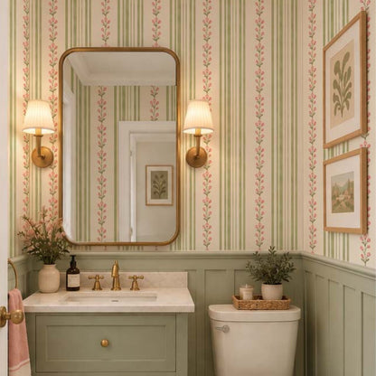 Powder room with Tulip Stripe wallpaper, pink tulips and sage green stripes above green wainscoting