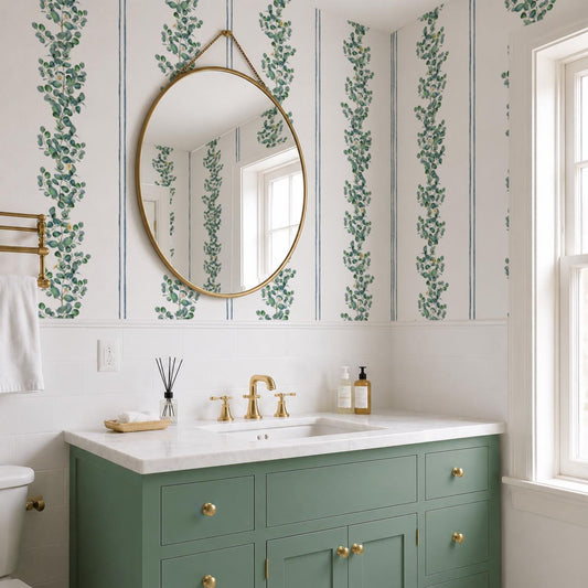 cat-610804236616 Eucalyptus stripe wallpaper above a sage green bathroom vanity with a round brass mirror
