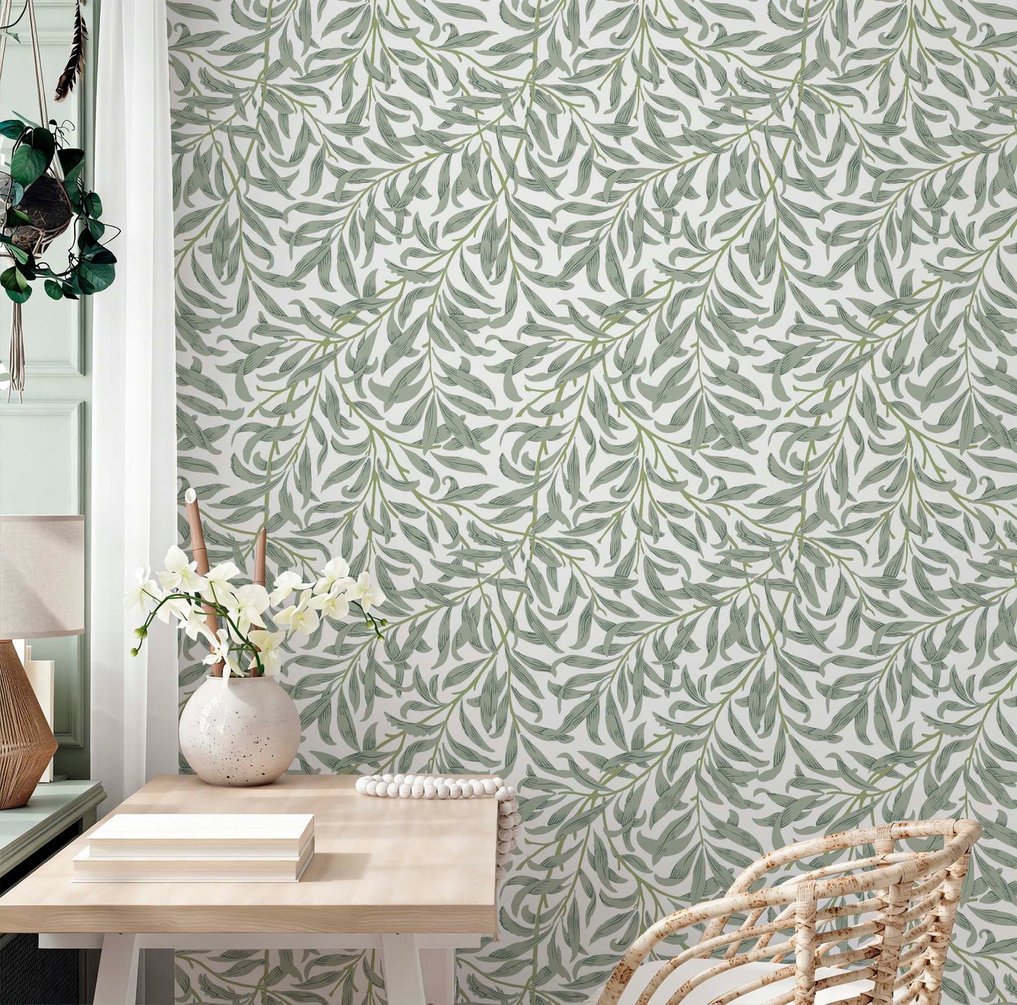 cat-610804433224 Decorative wallpaper featuring green willow leaf pattern by William Morris on a home office wall with a wooden desk