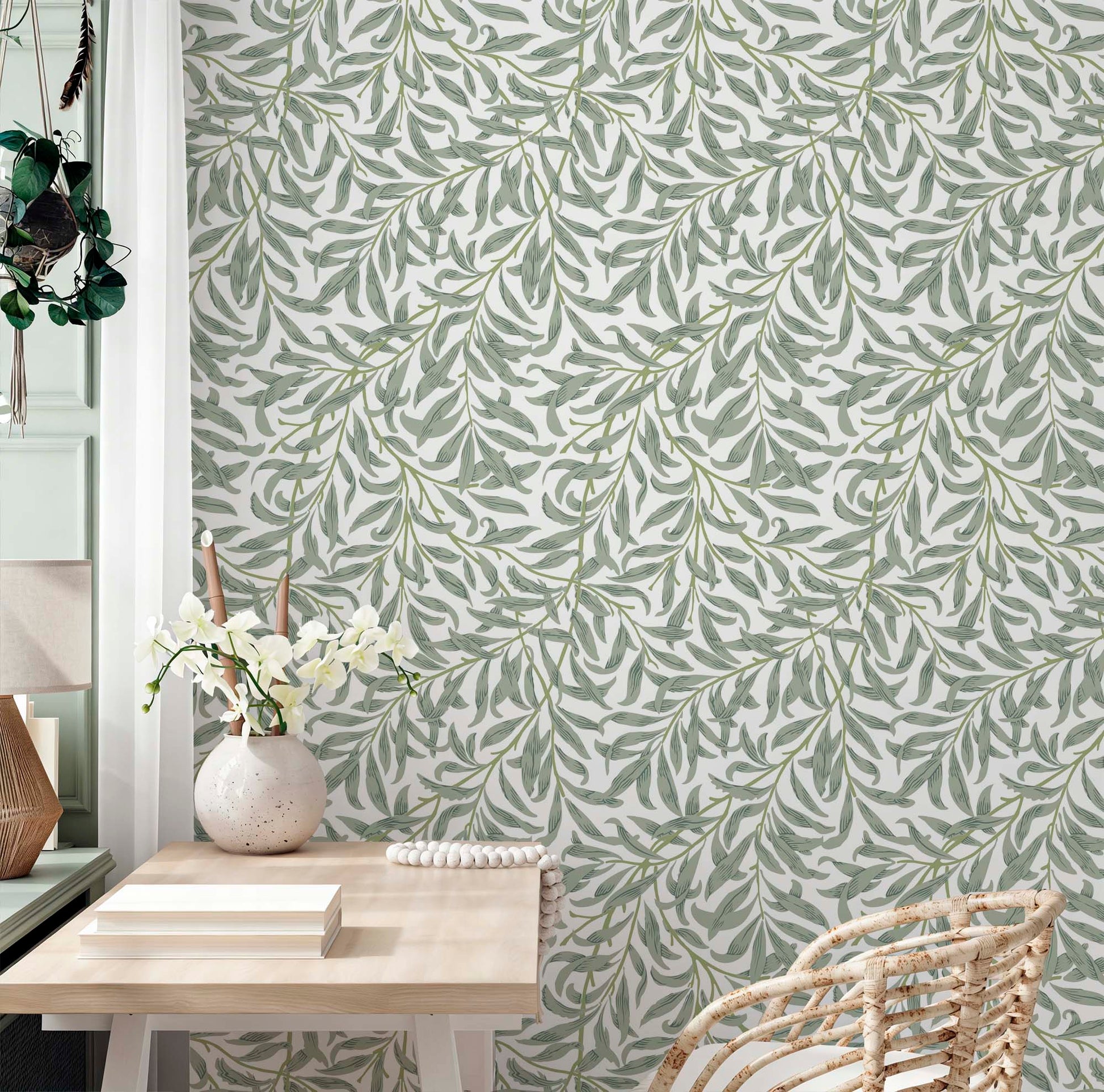 cat-610804433224 Decorative wallpaper featuring green willow leaf pattern by William Morris on a home office wall with a wooden desk