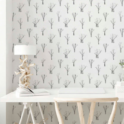 cat-610804433224 Home office with winter trees wallpaper in grey and white, minimal and calm workspace.