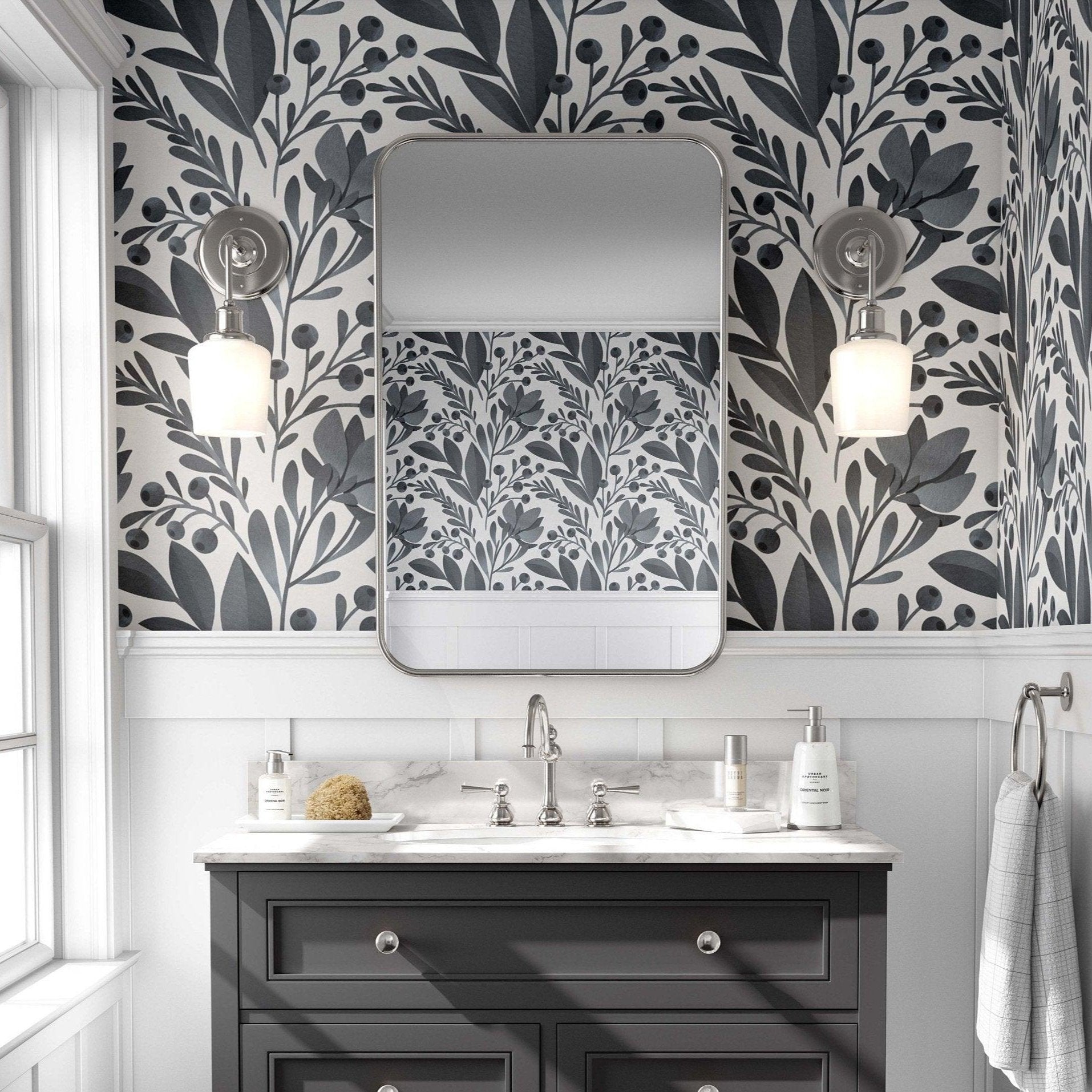 Elegant bathroom adorned with a greye and white leaves wallpaper, showcasing a chic grey vanity.