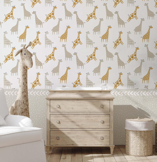 Giraffe pattern wallpaper in a nursery with mustard and beige tones, decorative chevron border, and dotted lower section