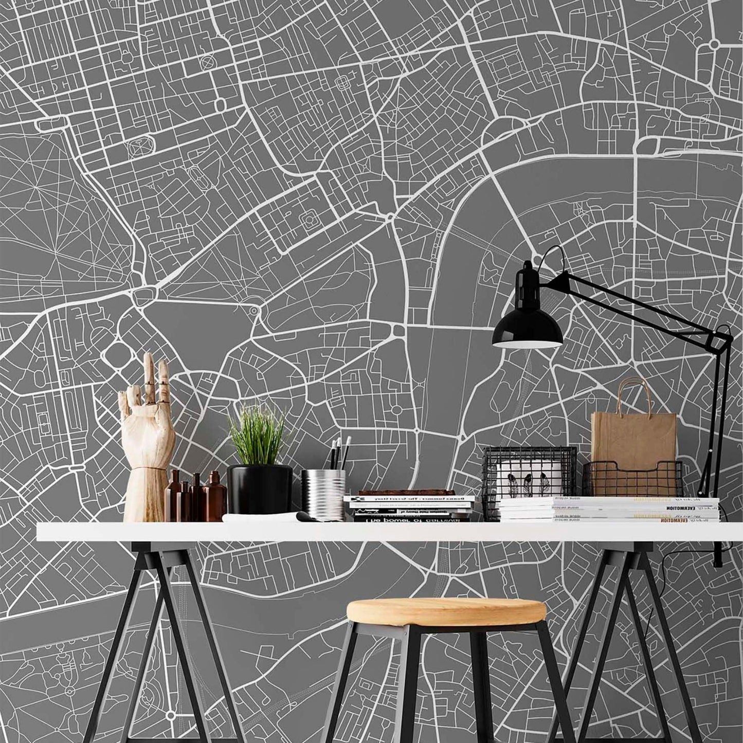 Office cat-660961526088 London street map mural wallpaper in dark grey and white in a home office with white desk, black lamp and wooden stool